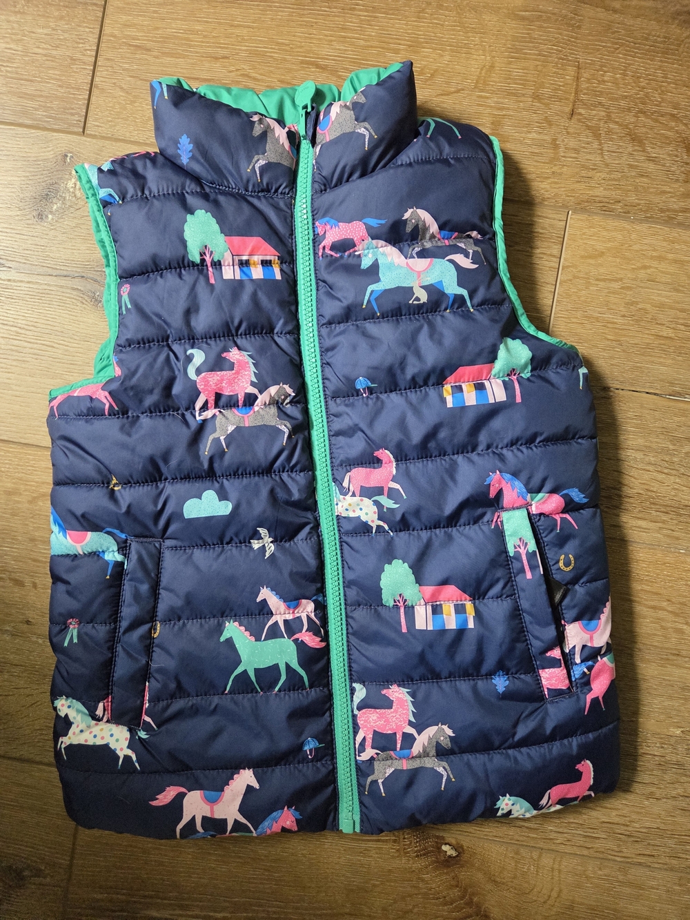 Joules Girls Navy Puffer Vest with Pink, Green & Blue Horse Print